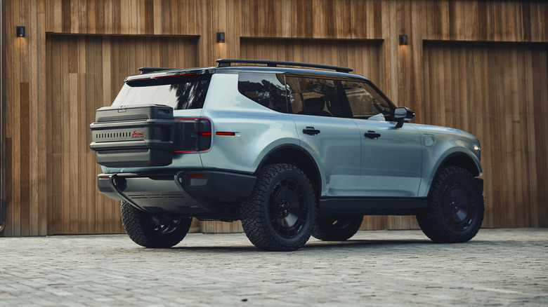 Pogled od zadaj 3/4 modrega koncepta Scout Traveler